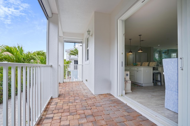 view of patio / terrace featuring a balcony