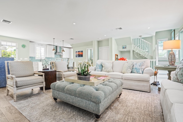 living room featuring light wood-type flooring