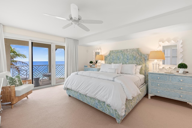 bedroom featuring carpet floors, access to exterior, and a ceiling fan