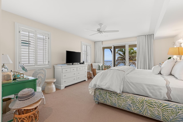 bedroom featuring access to exterior, carpet, and ceiling fan