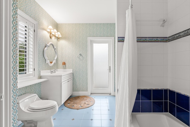 bathroom featuring tile patterned flooring, vanity, toilet, and wallpapered walls