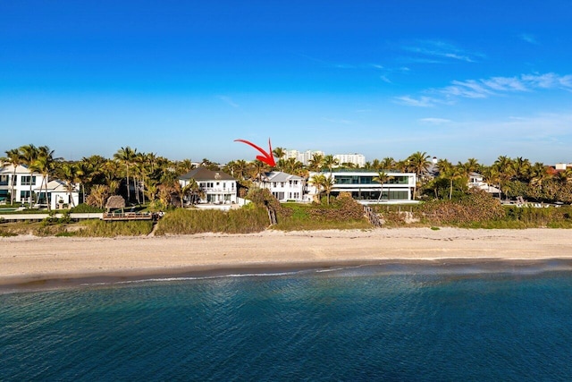 aerial view with a beach view and a water view