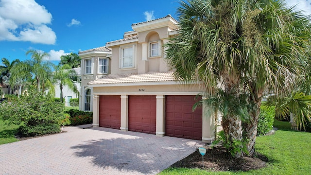 view of front of property featuring a garage