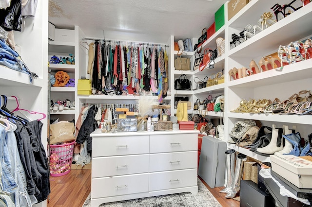 walk in closet featuring light wood-type flooring