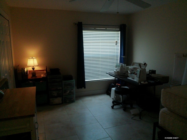 office space featuring ceiling fan and light tile patterned flooring