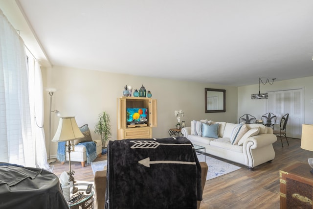 living room featuring plenty of natural light and hardwood / wood-style floors