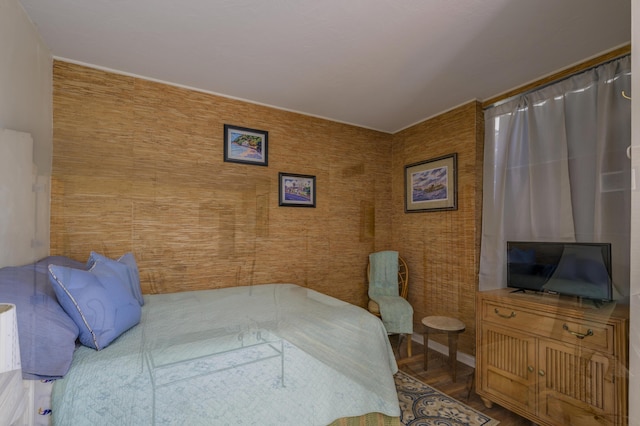 bedroom featuring hardwood / wood-style floors