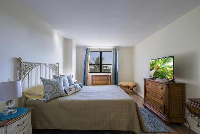 bedroom featuring hardwood / wood-style floors