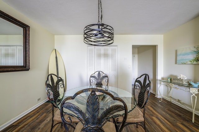 dining room featuring dark wood-type flooring