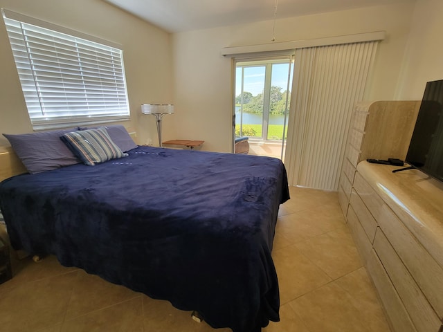 bedroom featuring light tile patterned floors