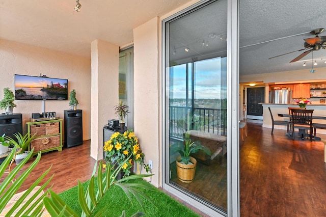 balcony featuring ceiling fan