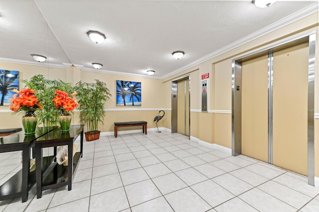 corridor featuring elevator, light tile patterned flooring, and crown molding