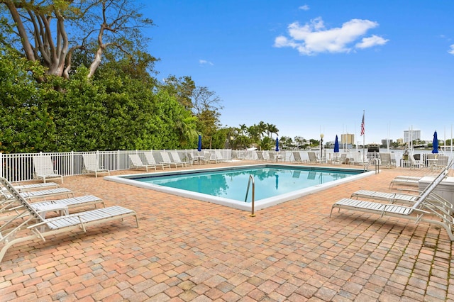 view of swimming pool with a patio area