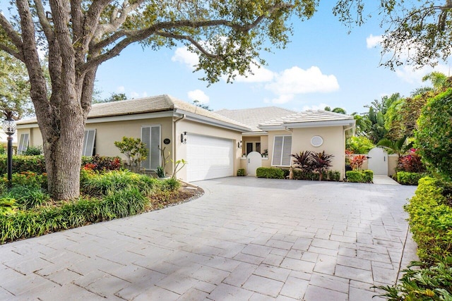 view of front of property featuring a garage