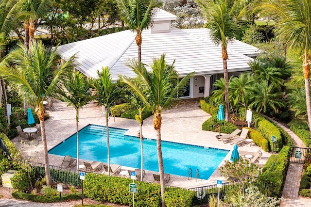 view of pool featuring a patio area