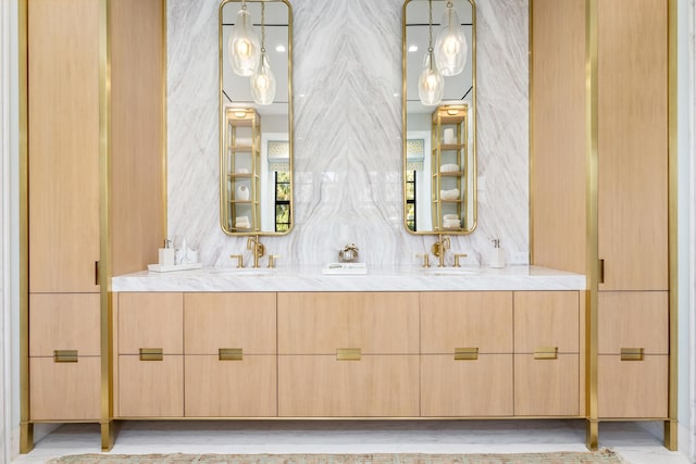 bathroom with double vanity and a sink