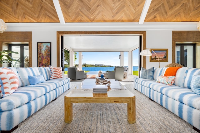 living room featuring wood ceiling and a water view