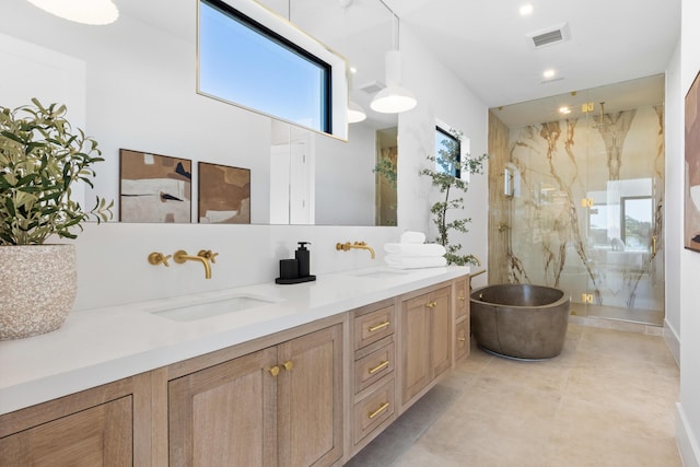 bathroom featuring plus walk in shower and vanity