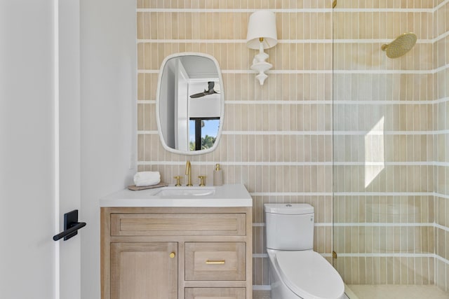 bathroom with toilet and vanity