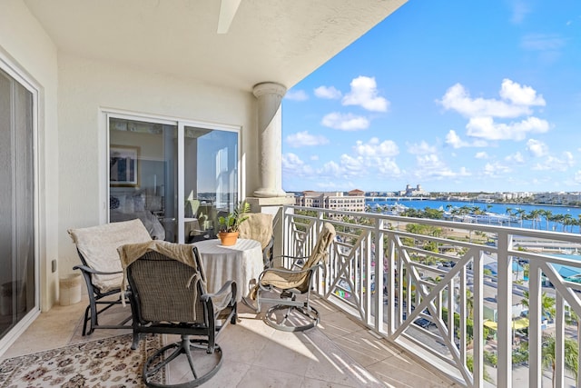 balcony featuring a water view