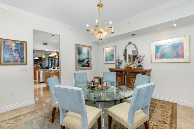 dining area featuring an inviting chandelier and crown molding