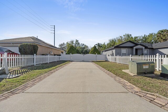 back of house with a patio and a garage