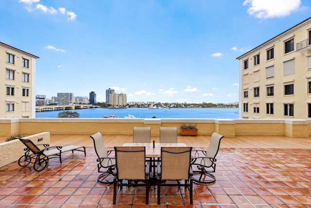 view of patio featuring a water view