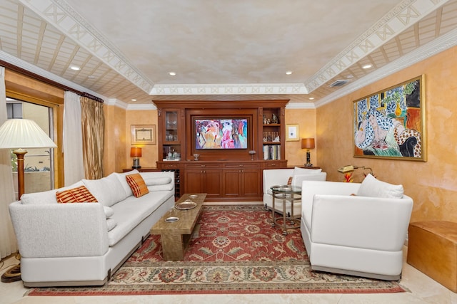 living room with a raised ceiling and ornamental molding