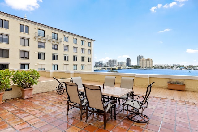 view of patio / terrace with a water view