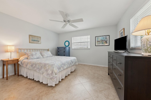 bedroom featuring ceiling fan and light tile patterned floors