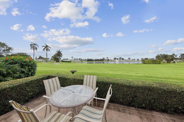 view of patio / terrace with a water view