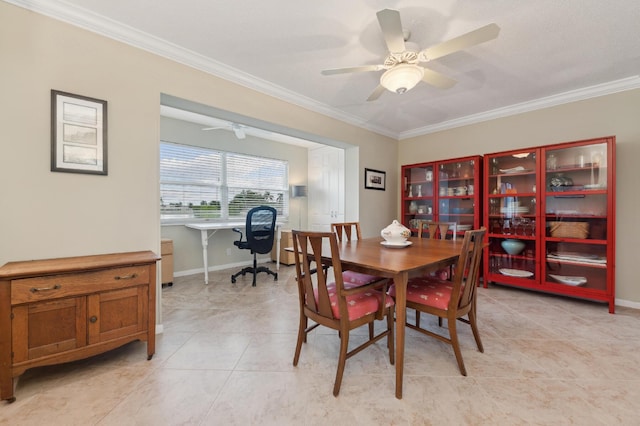 dining area with ceiling fan, light tile patterned flooring, and crown molding