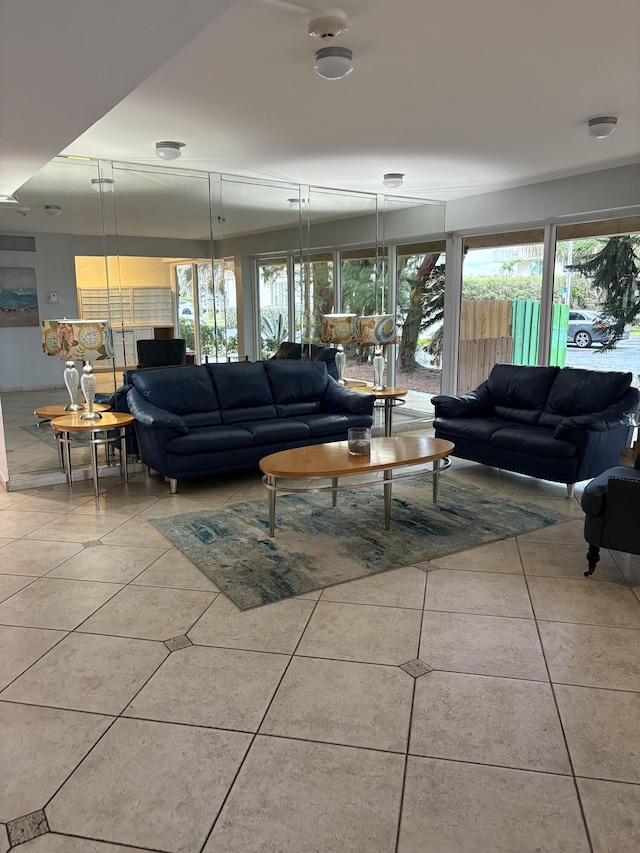 living room with tile patterned flooring