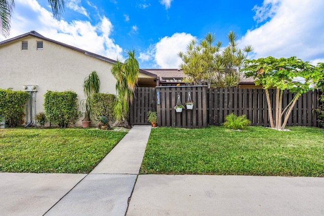 view of property exterior with a yard