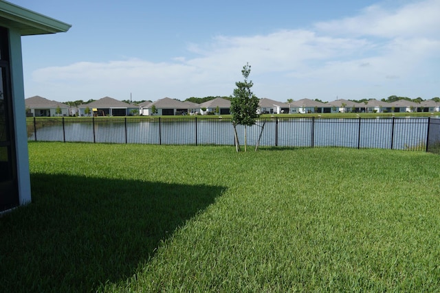 view of yard with a water view