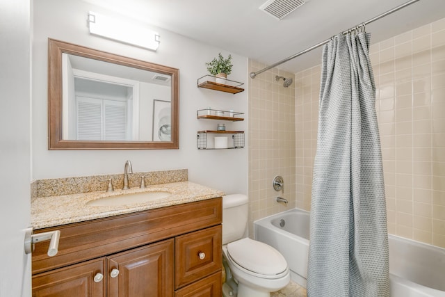 full bathroom featuring toilet, vanity, and shower / bath combination with curtain