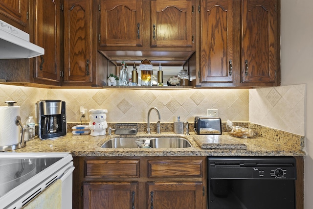 kitchen featuring sink, backsplash, light stone countertops, and dishwasher