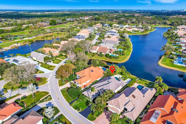 drone / aerial view with a water view