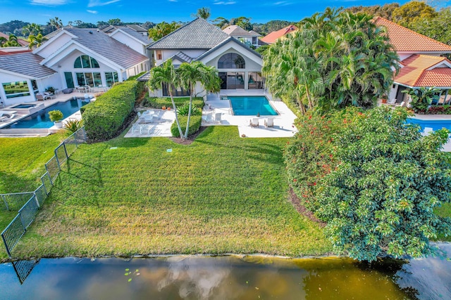 drone / aerial view with a water view