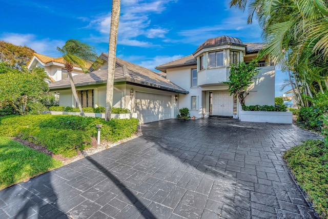 view of front of home featuring a garage