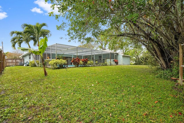 view of yard with a lanai