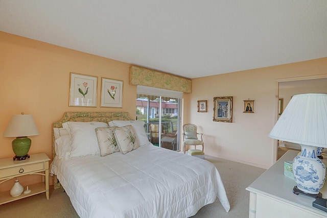 bedroom featuring light colored carpet