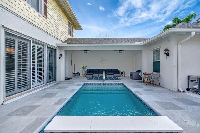 view of pool featuring an outdoor hangout area, ceiling fan, and a patio area