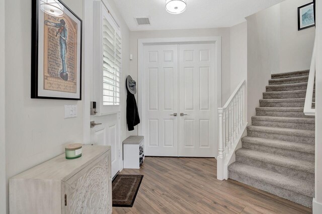 foyer entrance featuring light hardwood / wood-style floors