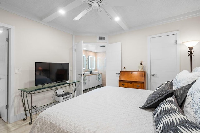 bedroom featuring a textured ceiling, ceiling fan, light wood-type flooring, and beamed ceiling