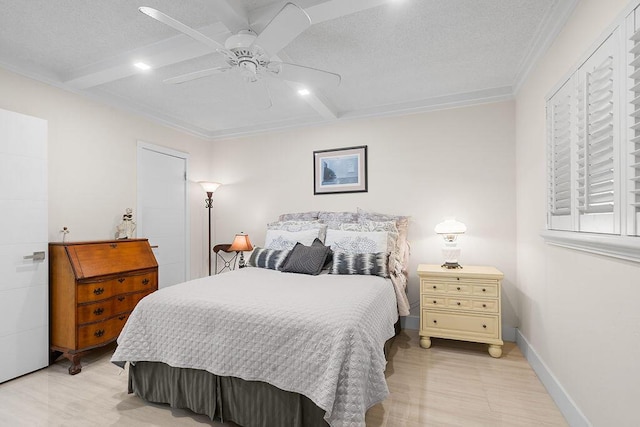 bedroom featuring ceiling fan, crown molding, a textured ceiling, and beam ceiling