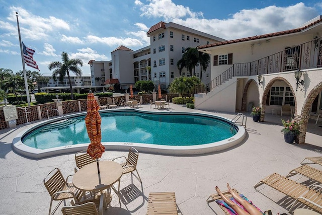 view of pool with a patio