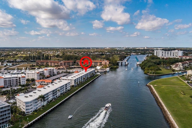 birds eye view of property featuring a water view