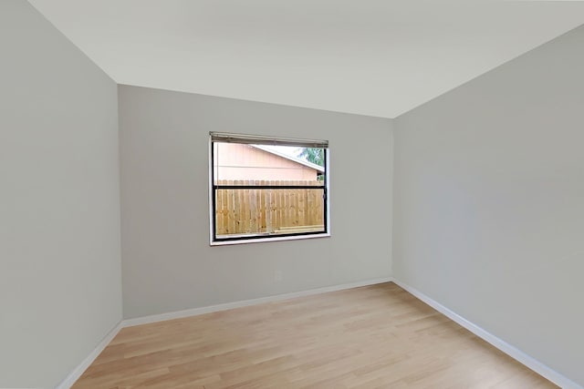 unfurnished room featuring light hardwood / wood-style floors