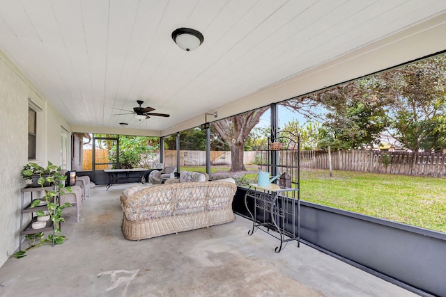 sunroom / solarium with ceiling fan